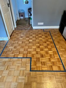 repaired wooden floor in Chessington
